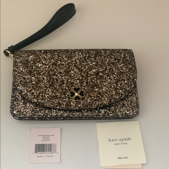 kate spade Handbags - Kate Spade Glittery Gold and Black Clutch Wristlet